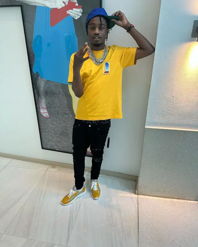 Lil Tjay outfit in Casablanca, Amiri, and Rhude, 2023