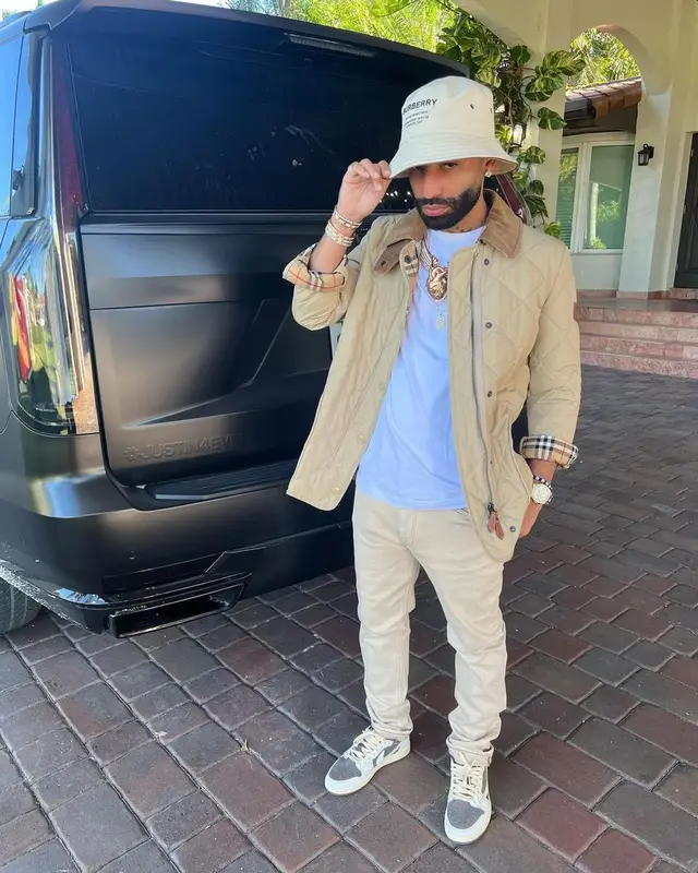 Arcangel outfit in Purple Brand, Nike, and Burberry, 2023