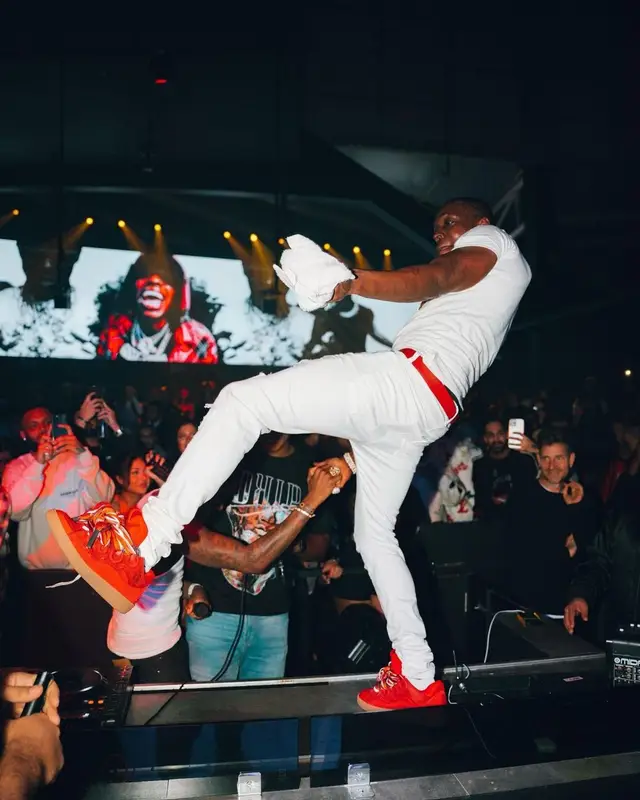 Bobby Shmurda outfit in Amiri, Lanvin, and Prada, 2023