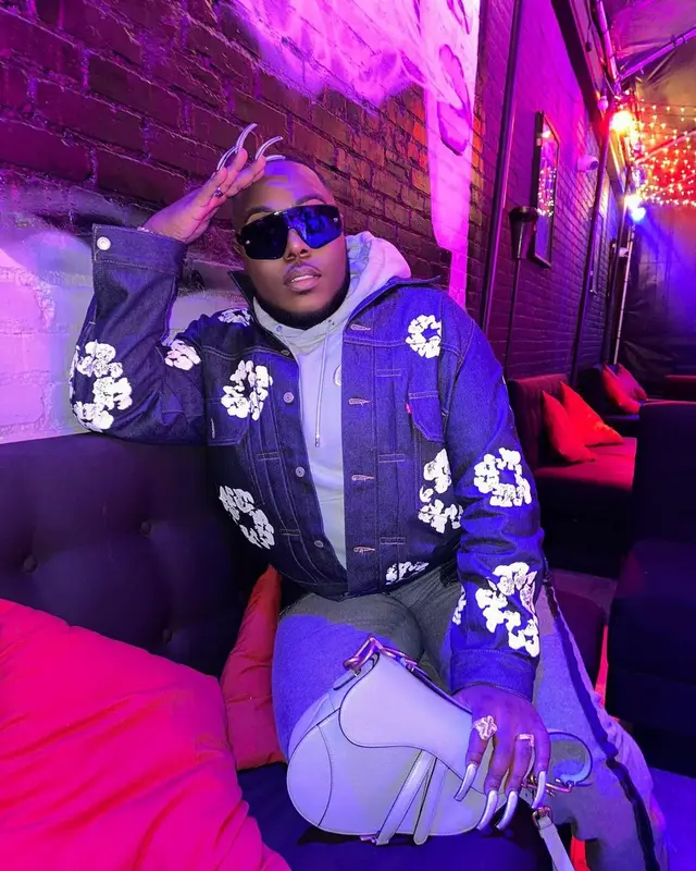 Saucy Santana outfit in Levi’s, Dior, and Denim Tears, 2023