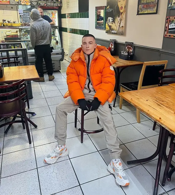 ArrDee outfit in Moncler, Stone Island, and Axel Arigato, 2023