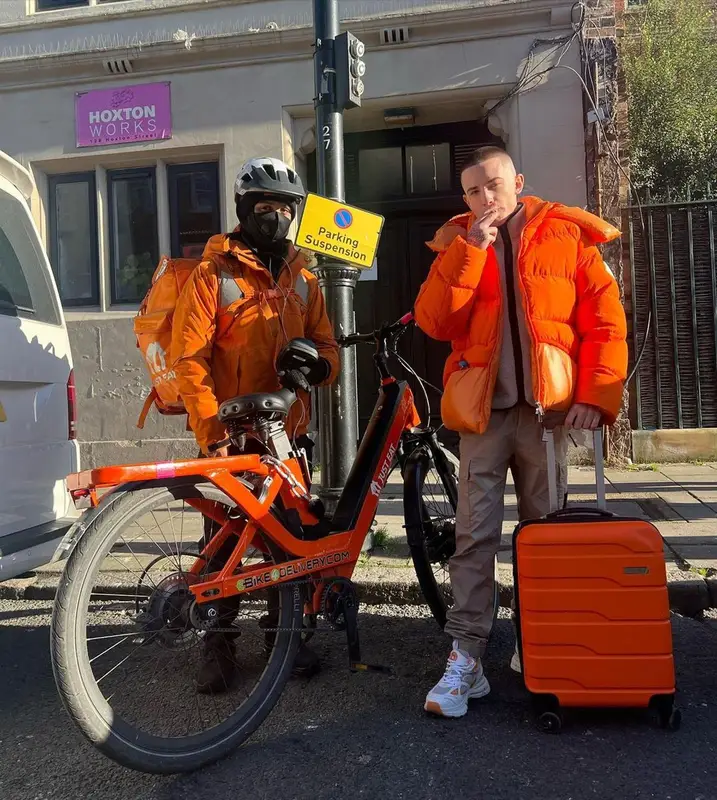 ArrDee outfit in Moncler, Stone Island, and Axel Arigato, 2023