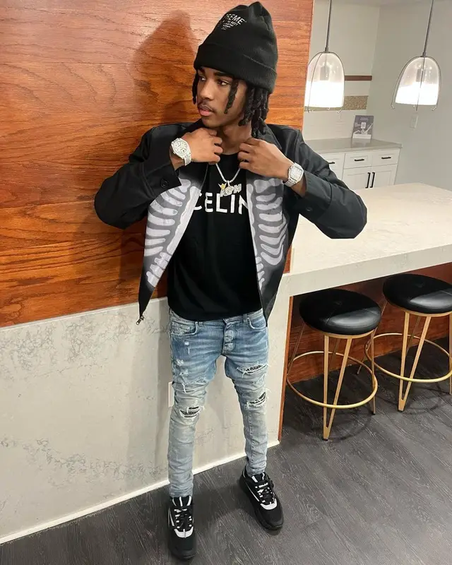 Lil Darius outfit in Celine, Amiri, and Supreme, 2023
