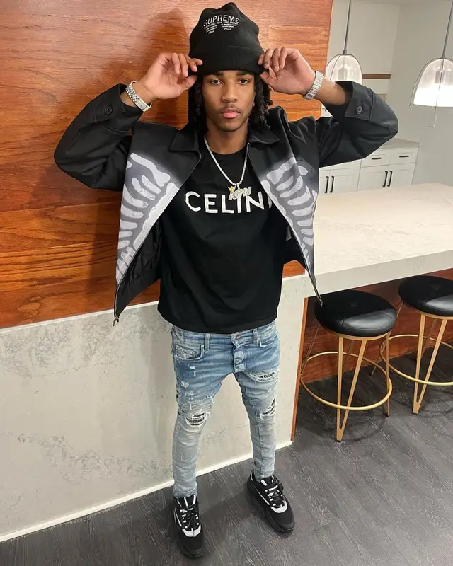 Lil Darius outfit in Celine, Amiri, and Supreme, 2023