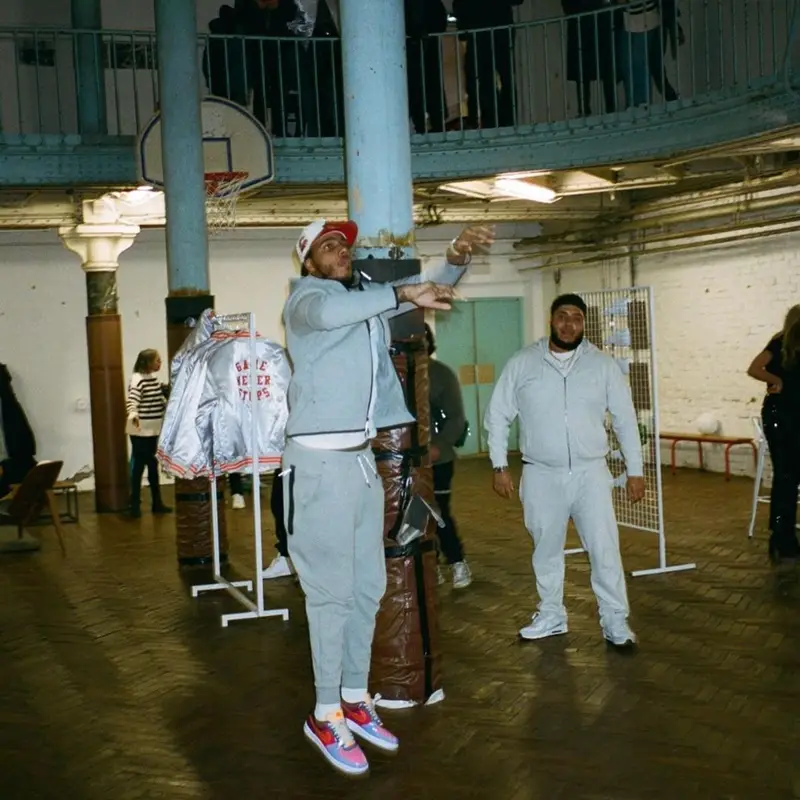 AJ Tracey outfit in Nike, Undefeated, and New Era, 2023
