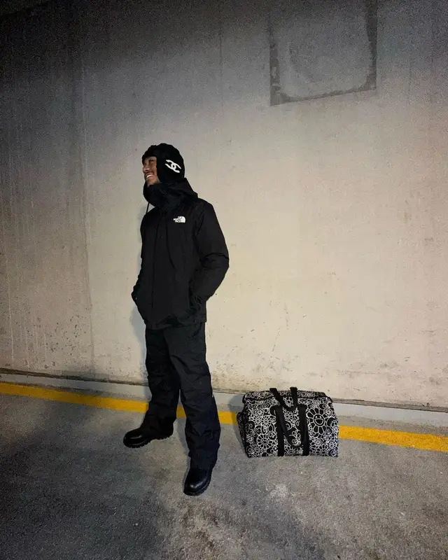 Lil Meech outfit in The North Face, Takashi Murakami, and Chanel, 2023
