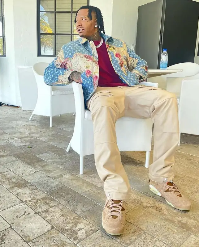 Moneybagg Yo outfit in Louis Vuitton, Burberry, and Jordan, 2023