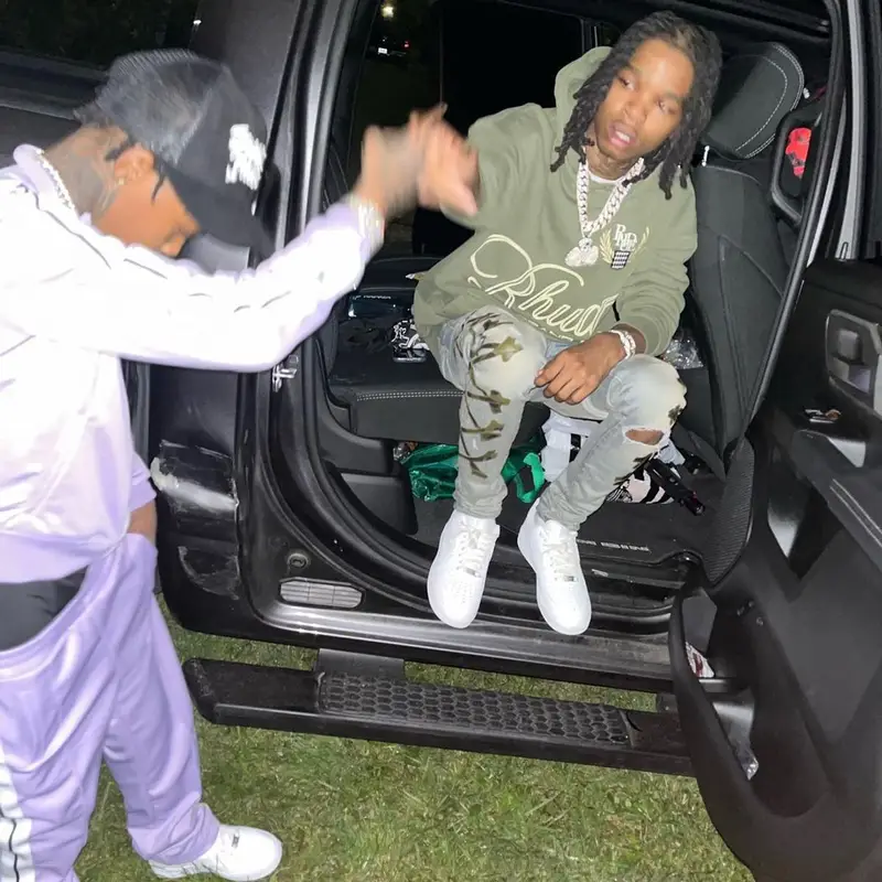 Lil 50 outfit in Palm Angels and Nike, 2022