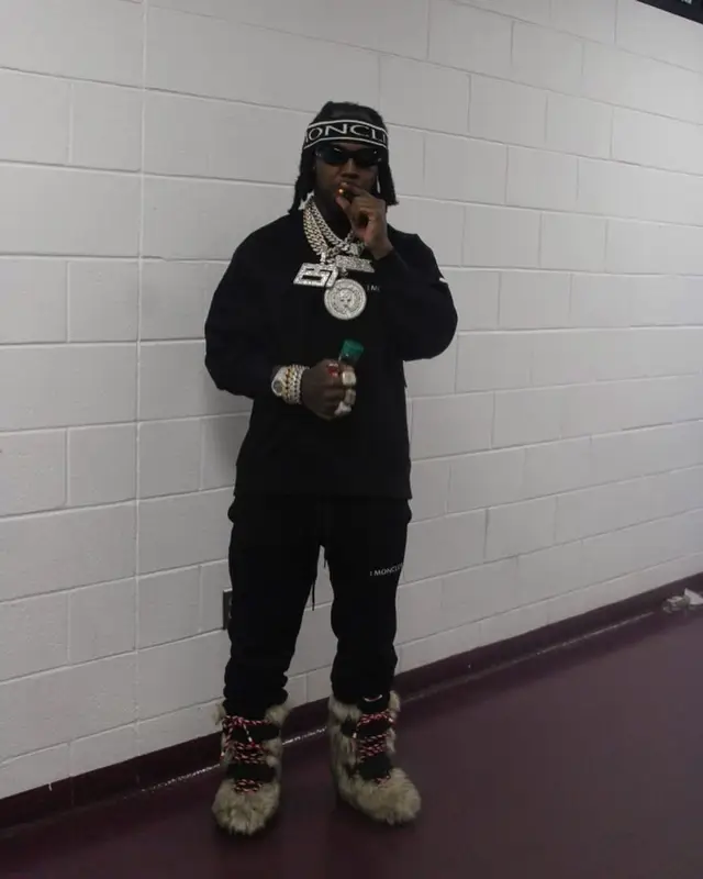EST Gee outfit in Hyke and Moncler, 2023