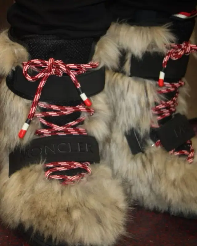 EST Gee outfit in Hyke and Moncler, 2023