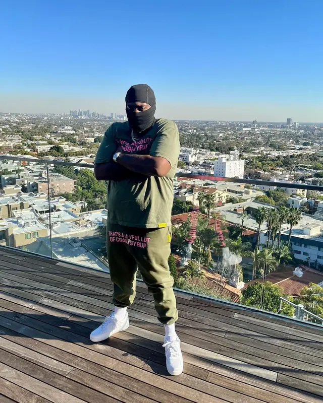 Peezy outfit in Awful Lot of Cough Syrup and Nike, 2023