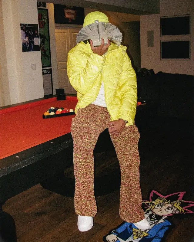 Lil Baby outfit in Louis Vuitton, Marni, and Nike, 2023
