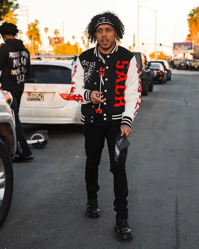 King Cid outfit in Sackrifices, Prada, and 2Clutch, 2023