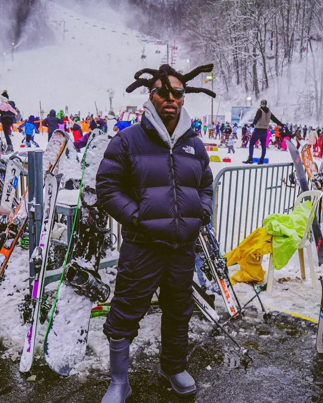 Lil Murden outfit in The North Face, Supreme, and Coach, 2023