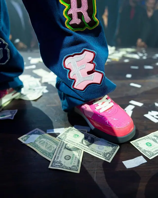 Slim Jxmmi outfit in Verborgen, Bape, and Fiji Water, 2023