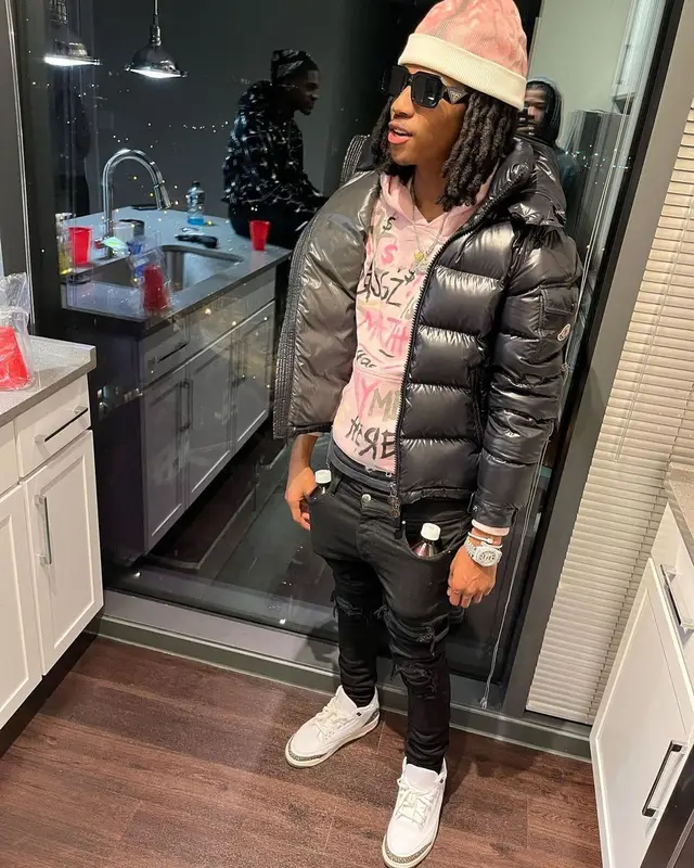 Lil Darius outfit in Moncler, Amiri, and Prada, 2023