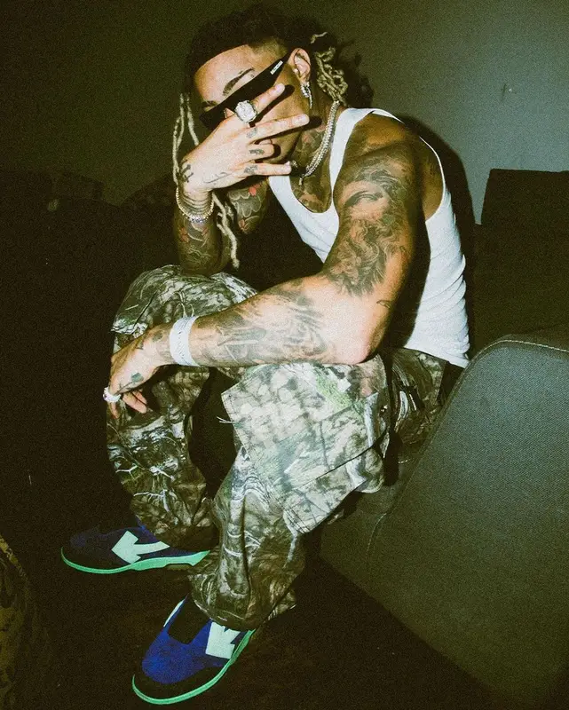 Ronny J outfit in Mossy Oak, Balenciaga, and Off-White, 2023