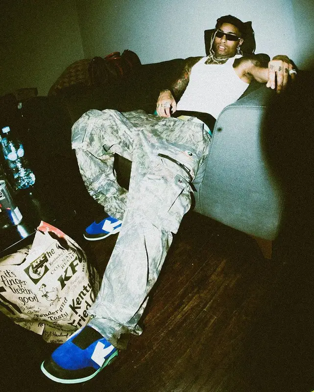 Ronny J outfit in Mossy Oak, Balenciaga, and Off-White, 2023