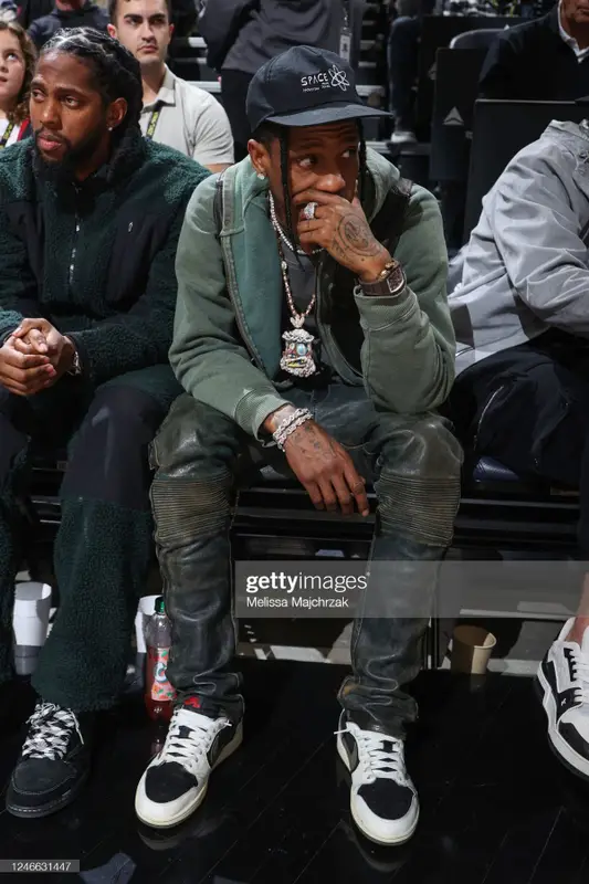 Travis Scott outfit in Raf Simons, Nike, and Space Village, 2023