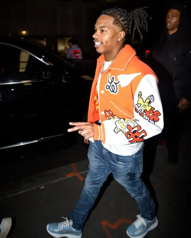 Lil Baby outfit in Louis Vuitton, Amiri, and Prada, 2023