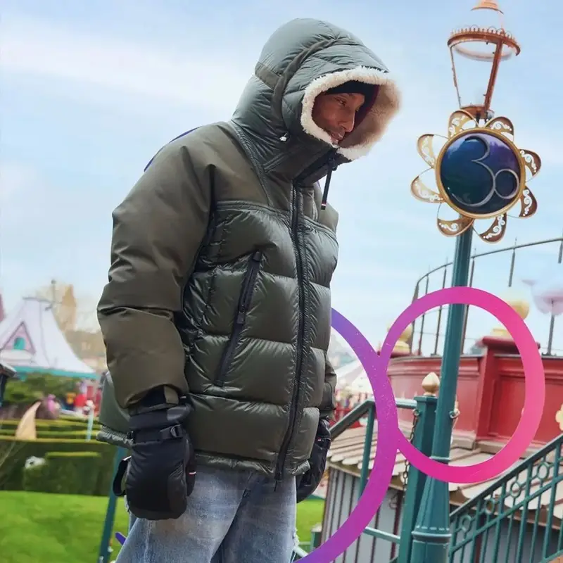 Pharrell Williams outfit in Moncler and Celine, 2023