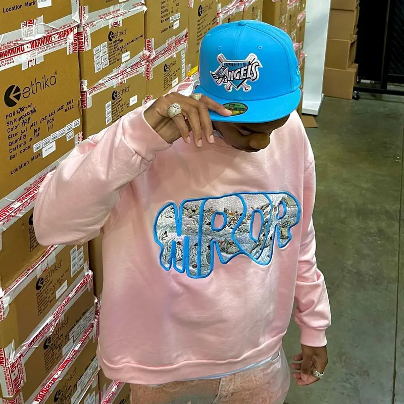 Cocash outfit in Who Decides War, Jordan, and DJ Khaled Merch, 2022