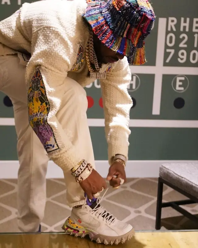 Fabolous outfit in Who Decides War, Denim Tears, and Nike, 2023