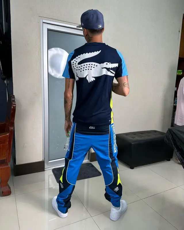 Central Cee outfit in Lacoste, Martine Rose, and Nike, 2023