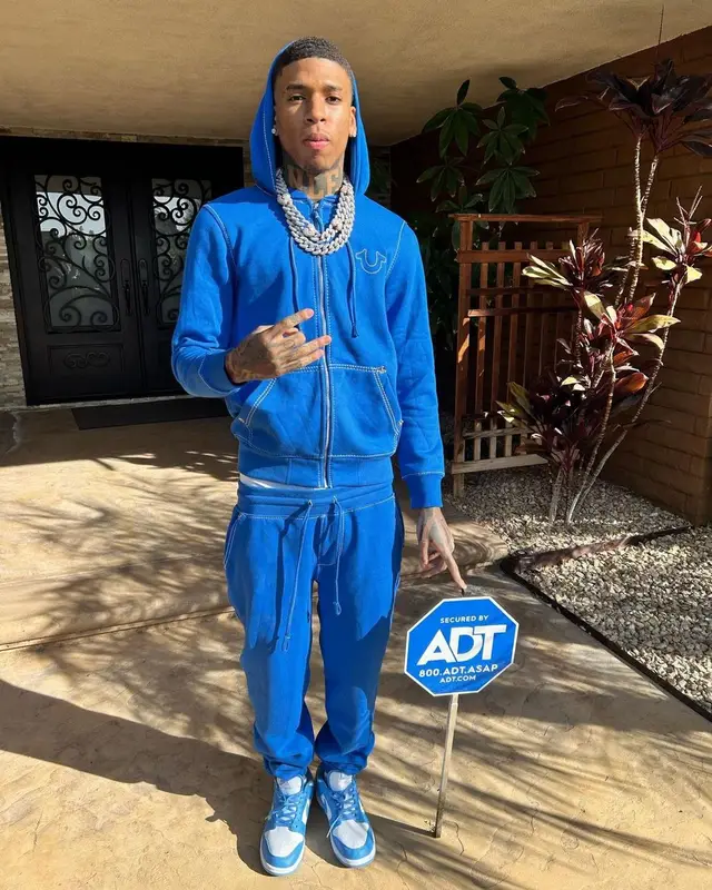 NLE Choppa outfit in True Religion and Nike, 2023