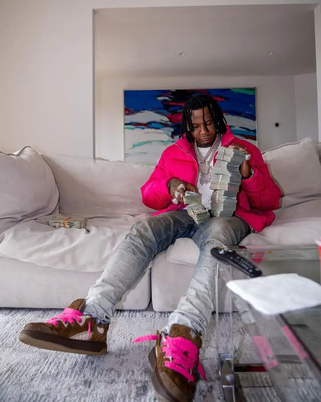 Moneybagg Yo outfit in ERL, Purple Brand, and Dior, 2023