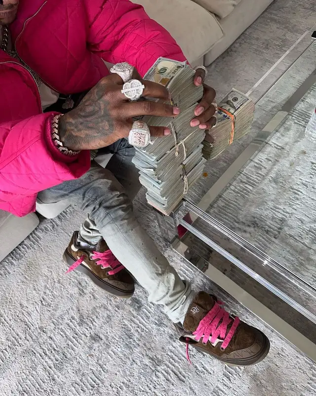 Moneybagg Yo outfit in ERL, Purple Brand, and Dior, 2023