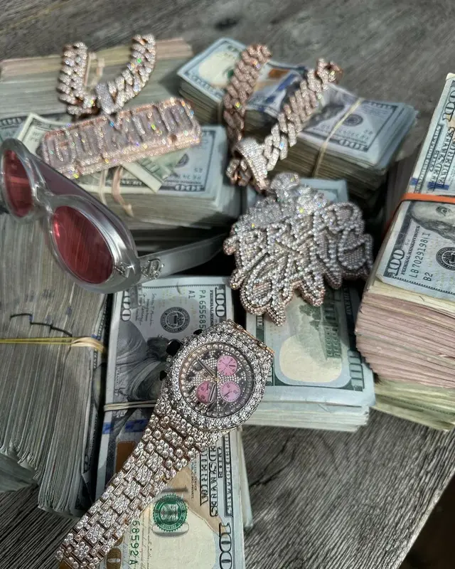 Moneybagg Yo outfit in ERL, Purple Brand, and Dior, 2023