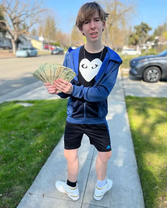 Lil Maceee outfit in Comme Des Garcons, Adidas, and Pony, 2023