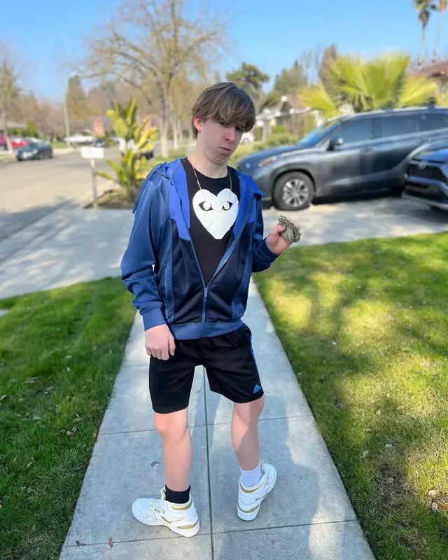Lil Maceee outfit in Comme Des Garcons, Adidas, and Pony, 2023