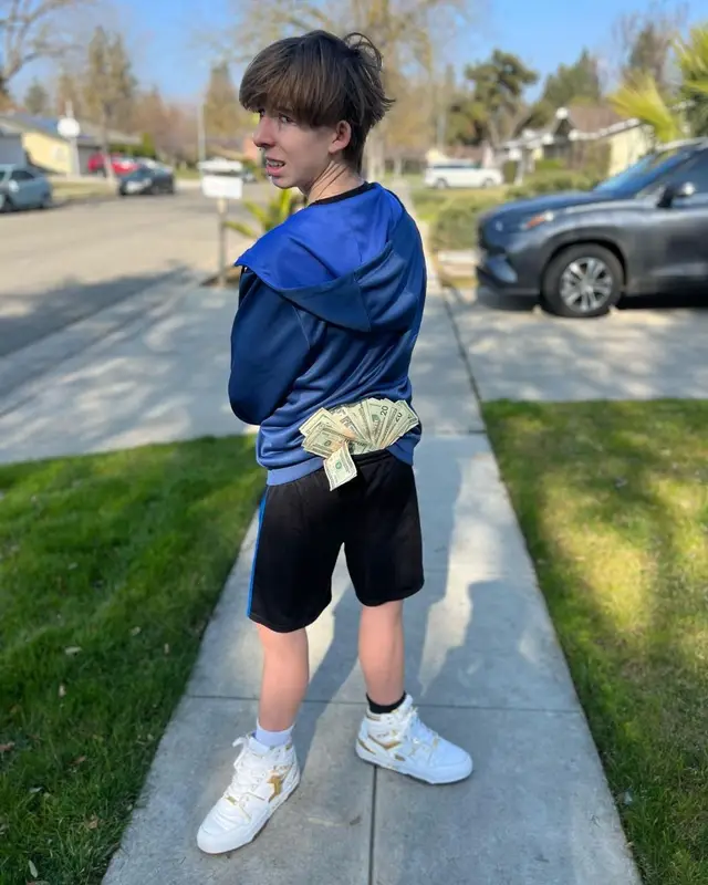 Lil Maceee outfit in Comme Des Garcons, Adidas, and Pony, 2023