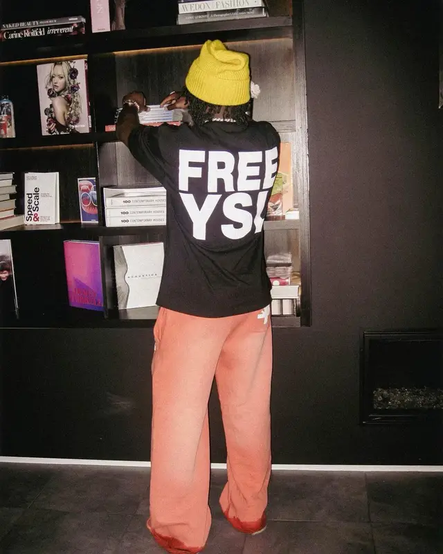 Lil Dann outfit in Awful Lot of Cough Syrup, Vertabrae, and Louis Vuitton, 2023