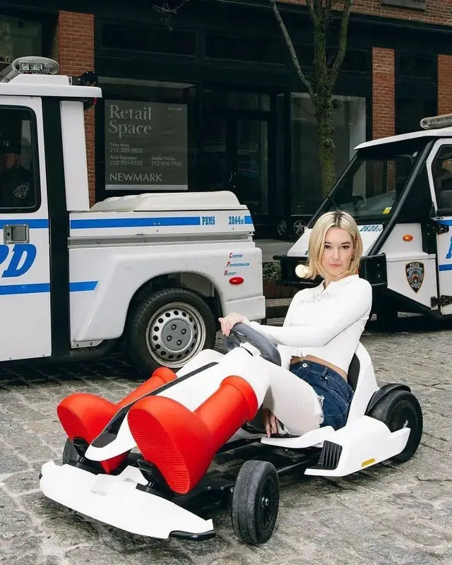Sarah Snyder outfit in Praying, Miu Miu, and MSCHF, 2023