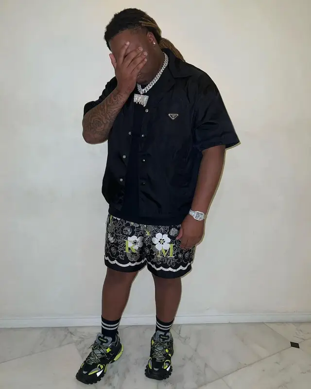 Tay Keith outfit in Prada, Amiri, and Balenciaga, 2023