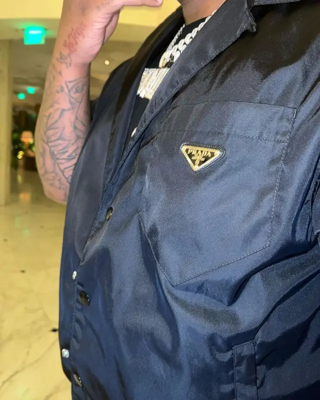 Tay Keith outfit in Prada, Amiri, and Balenciaga, 2023