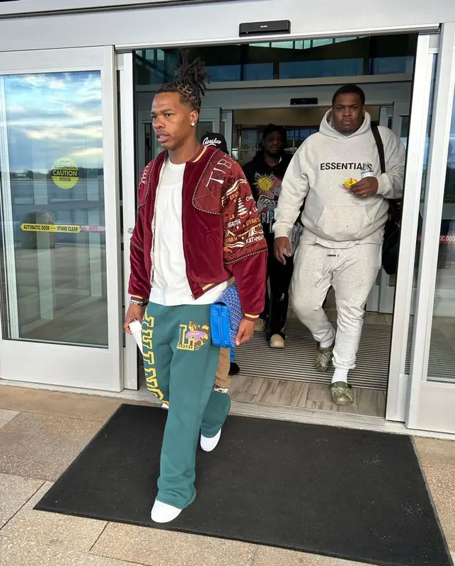 Lil Baby outfit in Kapital, Nike, and Goyard, 2023