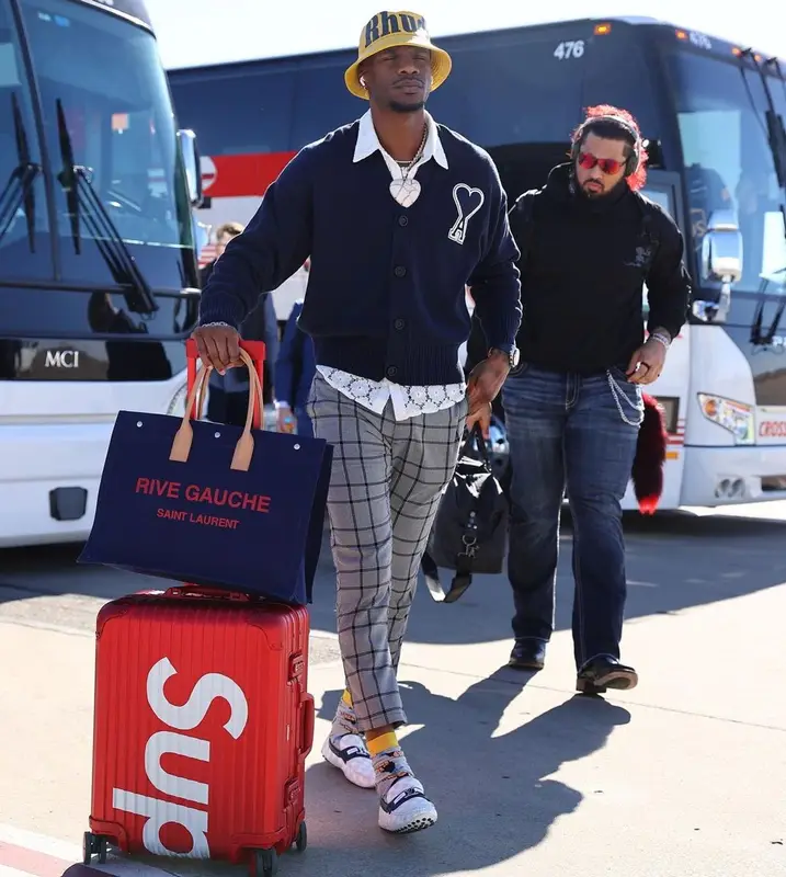 Marquez Valdes-Scantling outfit in Ami, Saint Laurent, and Rhude, 2023