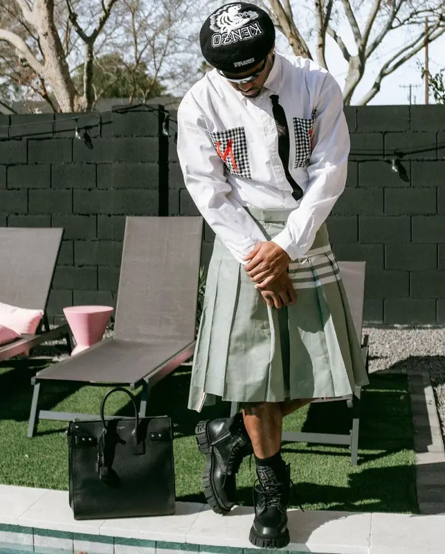 JuJu outfit in Thom Browne, Oakley, and Kenzo, 2023