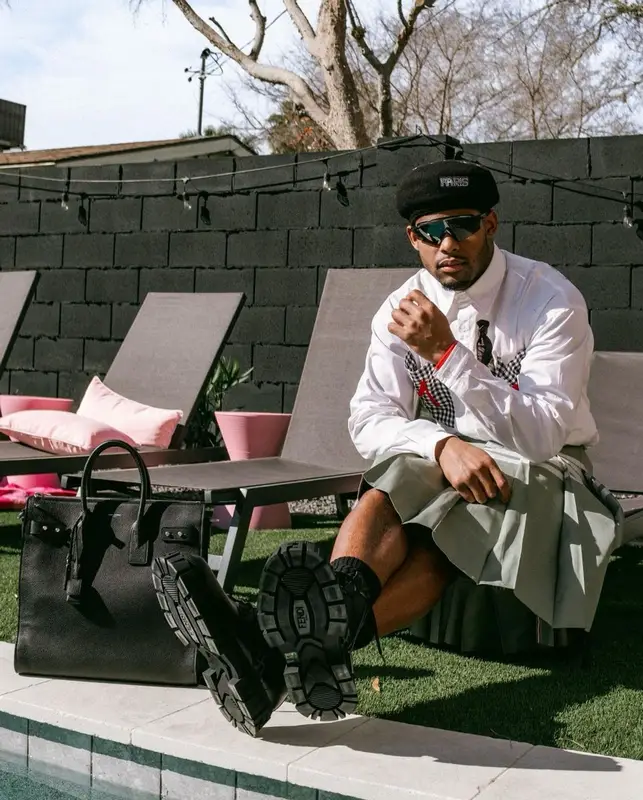 JuJu outfit in Thom Browne, Oakley, and Kenzo, 2023