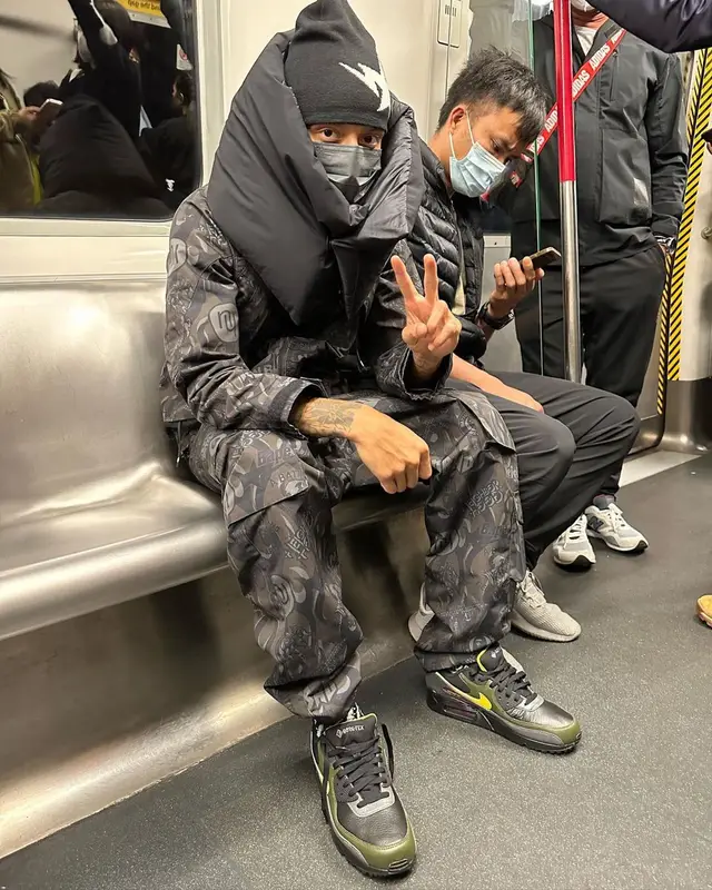 Central Cee outfit in Nike, Bape, and F.C.Real Bristol, 2023