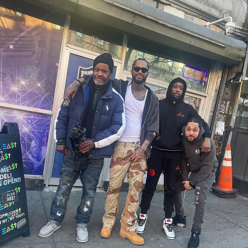 Dave East outfit in Gallery Dept., Ray-Ban, and Timberland, 2023