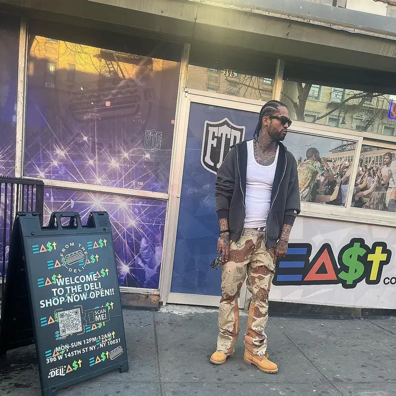 Dave East outfit in Gallery Dept., Ray-Ban, and Timberland, 2023