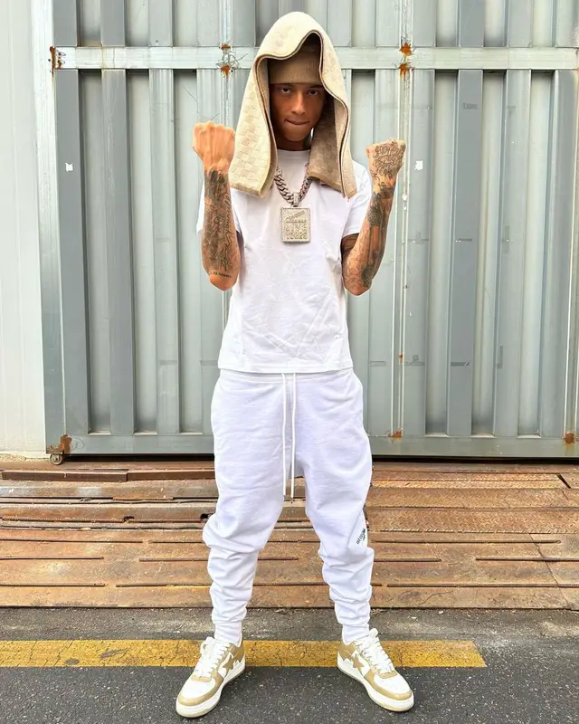 Central Cee outfit in We11done, Bape, and Louis Vuitton, 2023