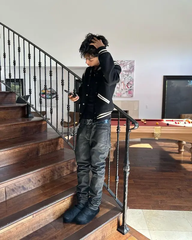 Yung Fazo outfit in Saint Laurent, Louis Vuitton, and Marni, 2023