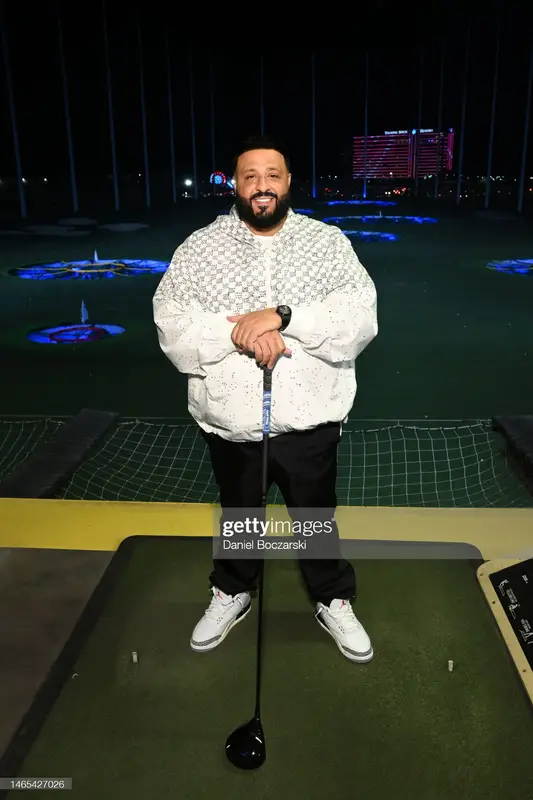 DJ Khaled outfit in Louis Vuitton, Prada, and Jordan, 2023