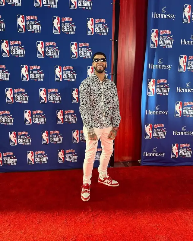 Anuel AA outfit in Louis Vuitton, Amiri, and Yayoi Kusama, 2023